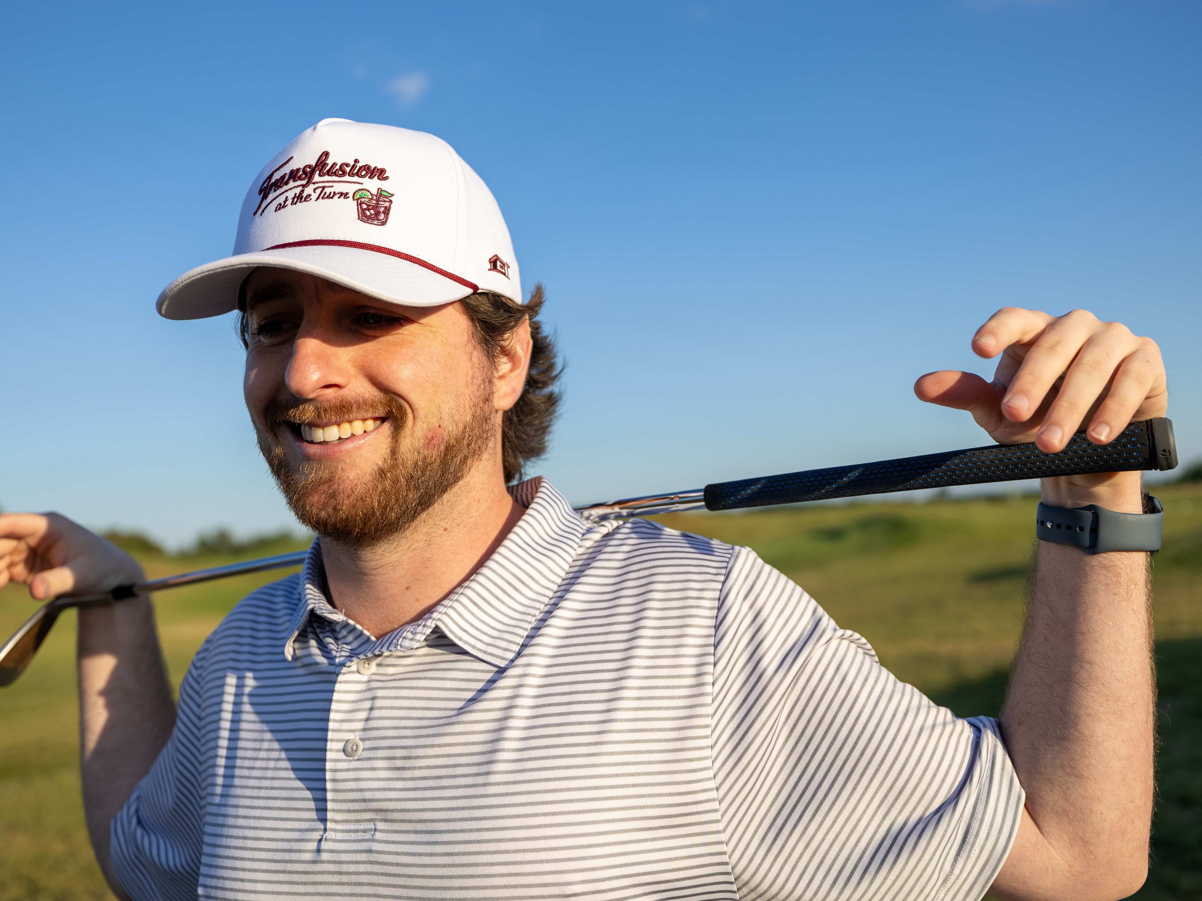 man wearing transfusion golf hat